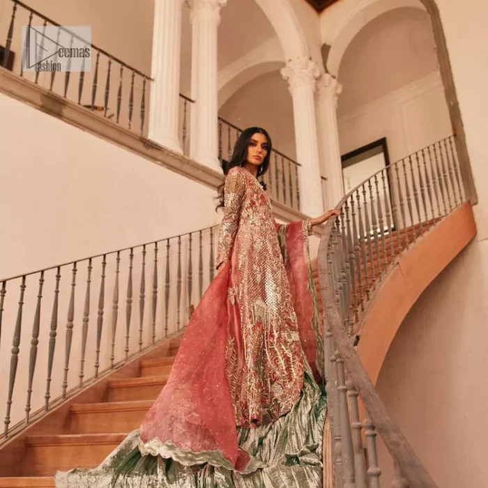 The latest elegant embroidered maxi in peach colour with magnificence embroidered work. The front open maxi is attractively laden with light golden embroidery to make this masterpiece unique and charming. Purely balanced raw silk maxi is presented with an ethereal blend of Resham, naqshi, kora, dabka and Mukesh carved with stones. Full Sleeves of the following maxi are also heavily embroidered. The round neckline gives it a magical look. It is coordinated with crushed lehenga in a pistachio green colour to create a ravishing Nikkah bride look. This crushed lehenga is paired with embroidered dupatta detailed with a splash of sequins and embroidered borders.