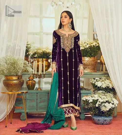 Dress yourself up in glamorous ensembles. DeemasFaashion presents this beautiful party outfit in plum colour. It is highlighted with golden