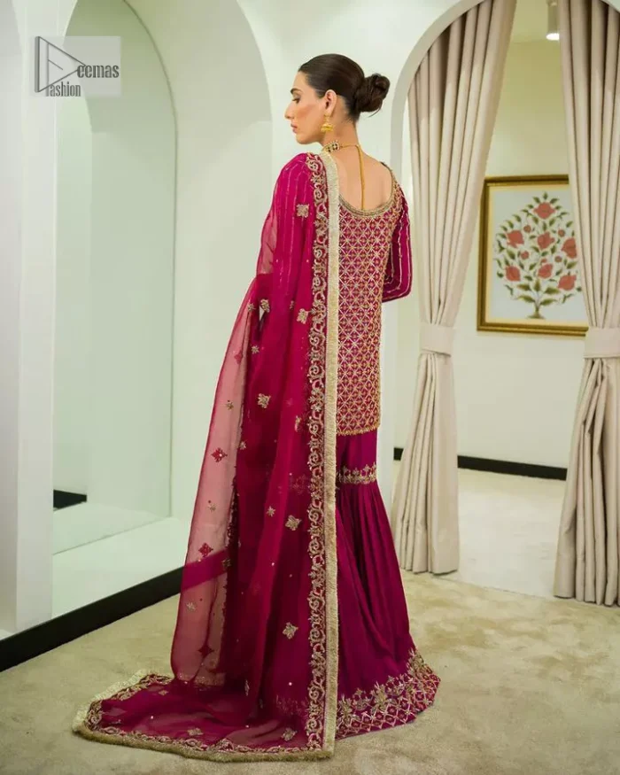 It’s bold, it’s romantic, it’s burgundy. The burgundy shade of this short shirt and gharara makes it an alluring choice for any event. Hand-crafted adornments and designs make this short shirt an epitome of beauty and royalty. The boat shape neckline o the beautiful shirt makes it a perfect choice to pair with the gharara. In addition to this, the beautiful adornments on the sleeves give a glamorous touch to this magnificent attire. It is coordinated with gharara in the same colour. The embellished borders and fine details give a perfect finish to this gharara. Finish this party wear with a dupatta framed with a four-sided border and sparkling tiny floral motifs all over to give a bold look.