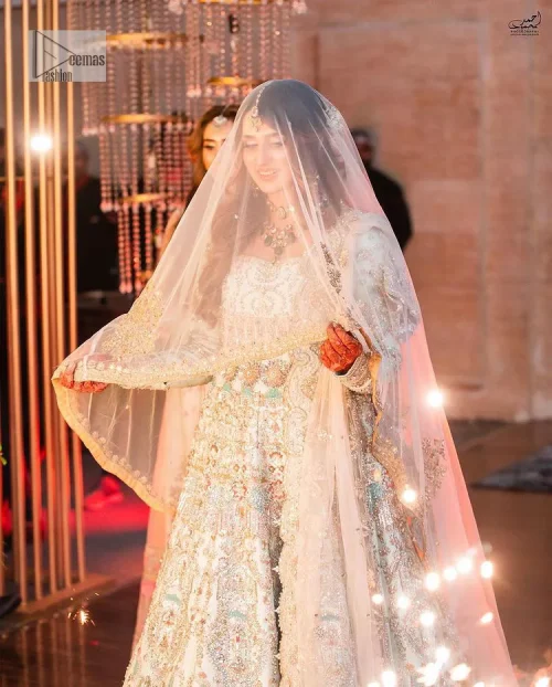 Brighten up your big day with this beautiful ensemble - Perfectly suited to the trend! DeemasFashion presents this nikah wear