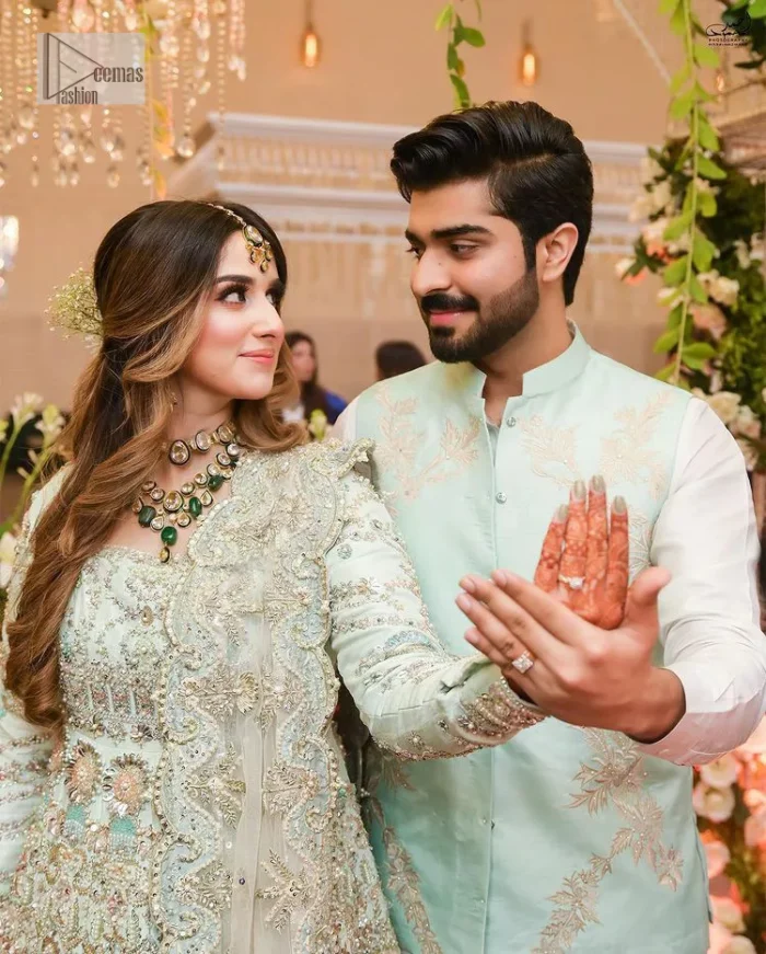 Brighten up your big day with this beautiful ensemble - Perfectly suited to the trend! DeemasFashion presents this nikah wear in the shade of ice blue. This stunning maxi has a fully embellished square neckline and full sleeves. Graceful multiple-colour work and floral designs enhance the charm of this maxi. Zardozi, pearls, dabka, kora, Kundan, and stones give a perfect finish to the overall look. The flares of the following maxi make it your foremost priority to wear on the most important day of your life. Paired this with a dupatta which is adorned with a four sided embellished borders and sequins sprayed all over to make this look more charming and perfect.
