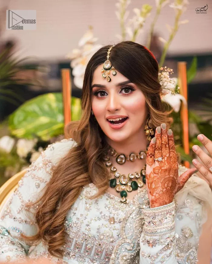 Brighten up your big day with this beautiful ensemble - Perfectly suited to the trend! DeemasFashion presents this nikah wear in the shade of ice blue. This stunning maxi has a fully embellished square neckline and full sleeves. Graceful multiple-colour work and floral designs enhance the charm of this maxi. Zardozi, pearls, dabka, kora, Kundan, and stones give a perfect finish to the overall look. The flares of the following maxi make it your foremost priority to wear on the most important day of your life. Paired this with a dupatta which is adorned with a four sided embellished borders and sequins sprayed all over to make this look more charming and perfect.