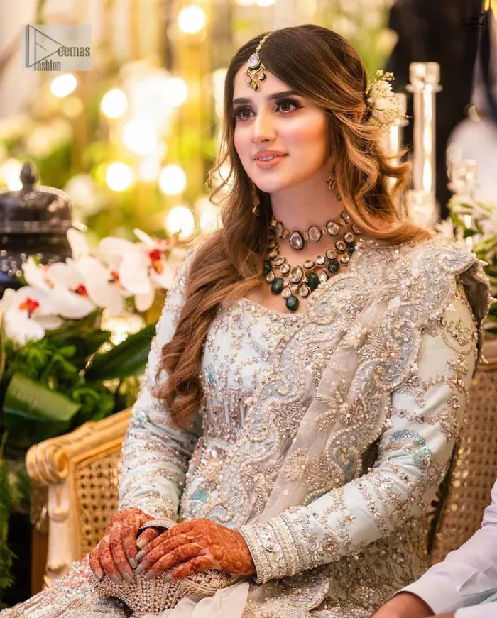 Brighten up your big day with this beautiful ensemble - Perfectly suited to the trend! DeemasFashion presents this nikah wear in the shade of ice blue. This stunning maxi has a fully embellished square neckline and full sleeves. Graceful multiple-colour work and floral designs enhance the charm of this maxi. Zardozi, pearls, dabka, kora, Kundan, and stones give a perfect finish to the overall look. The flares of the following maxi make it your foremost priority to wear on the most important day of your life. Paired this with a dupatta which is adorned with a four sided embellished borders and sequins sprayed all over to make this look more charming and perfect.
