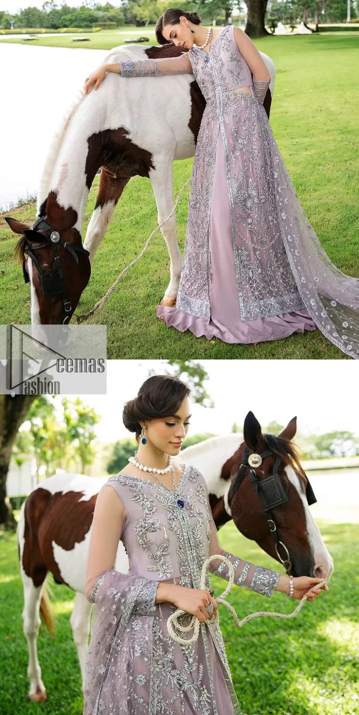 Lilac article on your Big day is like a pro. This lilac front open gown in the lilac shade is the epitome of royalty and grace. The gorgeous gown is adorned with silver dabka, pearls,tilla, kora, Kundan, zardozi and the real magic of beads. It is prominent with silver embroidery. The following gown has a V shape neckline to make this outfit remarkable. Further, the beautiful embroidery is adorned on full sleeves. The fully embellished lilac Gown will look perfect when paired with a set of plain lehenga choli. It is organized with a dupatta framed with four-sided borders and tiny floral motifs all over to gain pro magic.