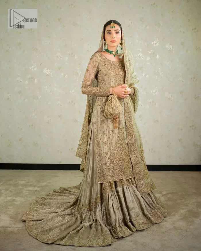 Comfy is a mood. The latest style of shirt sharara in high-quality fabric detailing with light gold gota, zari, dabka, sequence, naqshi, stones & tilla work all over the outfit. Full embellished shirt with full detailing and heavy neckline design with high-quality inner. Further, the beautiful floral motifs are adorned on sleeves to make this masterpiece super aesthetic It is coordinated with sharara with heavy embroidery on the border. The floor-length sharara gives a unique look. Complete this walima wear with a dupatta adorned with four-sided embellished frames and sequins sprayed all over.
