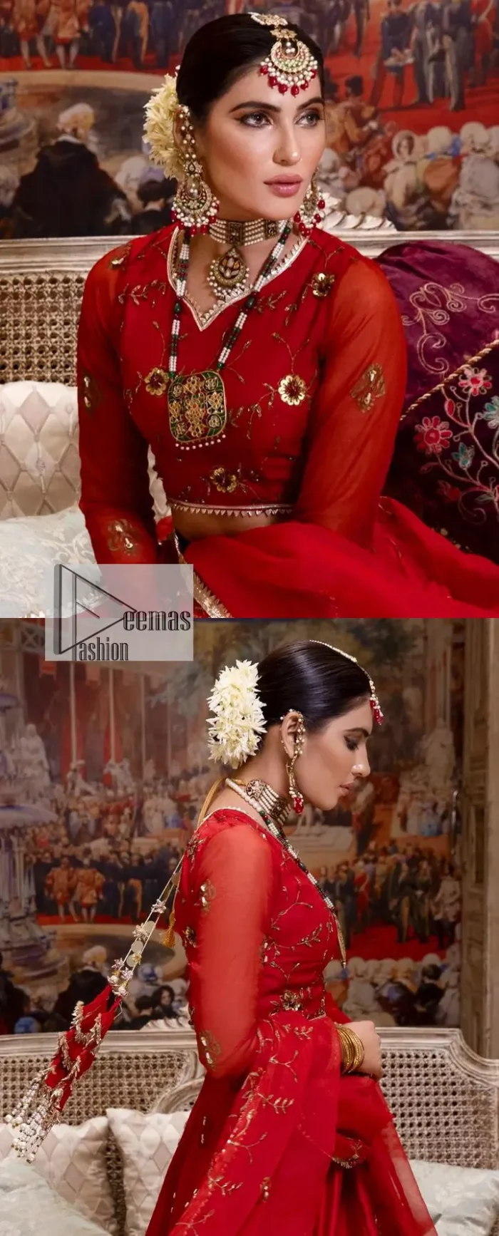 Statement suiting in red. This red blouse comes with a lehenga and dupatta in premium fabric quality. The blouse is beautifully decorated with fine embroidery work accompanied by iridescent sequins, tilla, dabka, kora and Zardozi. Furthermore, beautiful artistry on the neckline is highlighted with golden embroidery accompanied by cutwork counting more to the elegance of this luxurious attire. It is organized with a flared lehenga in the same colour. This embroidered lehenga comes is very neatly stitched and decorated with lavish embroidery and minimal floral motifs making this dreamy attire look heavenly and your ultimate priority. Complete this reception wear with a dupatta framed with four-sided embellished borders that is your favourite statement on your big day.