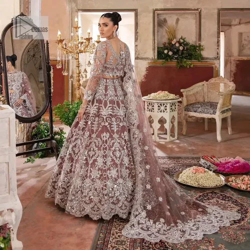 It’s regal, it’s rich, it’s festive. This magnificent nikah outfit is hand-embellished with luxury designs and beautiful silverwork which is