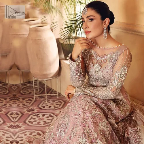 This elegantly poised ensemble defines nikah fashion in its most refined form! The scalloped maxi in premium quality is hand-embellished