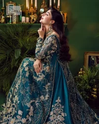 Let the outfit speak for itself! DeemasFashion presents this party wear in teal blue colour.  Be a centre of attraction by donning this beautiful teal blue long shirt embellished with tilla, dabka, kora, Kundan and sequins work which is further intensified with silver and golden embroidery. The shirt is emphasized with a sweetheart neckline and full sleeves to make your day super romantic. It is organized with a lehenga which is embellished with embroidered floral motifs to explain the love of the bride. To finish this article, the last but not least piece comes that is the dupatta which is adorned with four-sided heavily embellished borders and sequins spray that accentuates the whole look.