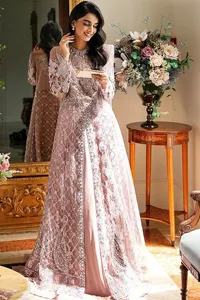 Incoming: that nikkah feeling with some flowers. Unique maxi for nikkah outfit in soft pink colour is embellished with silver pearls sequins, kora, dabka, tilla, Zardozi and Kundan work. Maxi Sleeves are fully embellished with embroidery and are in floral patterns. The Jewel neckline also makes this masterpiece unique and charming. Maxi Hemline is decorated with embroidery on the border. Further, the front open style makes it a perfect choice to pair with the dupatta. It is organized with a plain lehenga to balance the overall outfit. Complete this article with a dupatta framed with four-sided embellished scalloped borders and sequins sprayed all over.