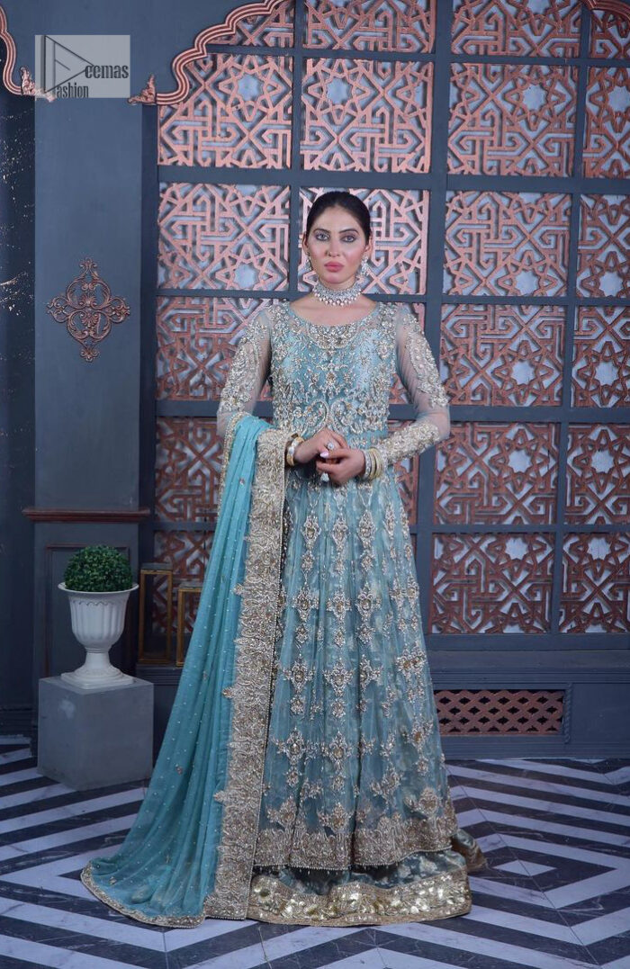 Serving looks we love. DeemasFashion presents this party outfit in sky blue colour which is adorned with silver embroidery and further prominent with tilla, dabka, kora, Kundan, Zardozi and the real magic of crystals. The round neckline looks like a complete diva since it is so opulent and vibrant. Further, the full sleeves make this masterpiece lovely and charming. It is organized with lehenga made with pure jamawar which speaks for itself. Complete this outfit with a dupatta framed with four-sided borders that have been carefully added for the additional finishing touch.