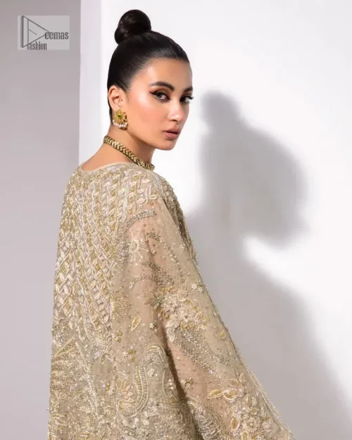 A little classy, a little sassy – that’s your style! An ivory floor-length kaftan with hand embellished work using dabka,
