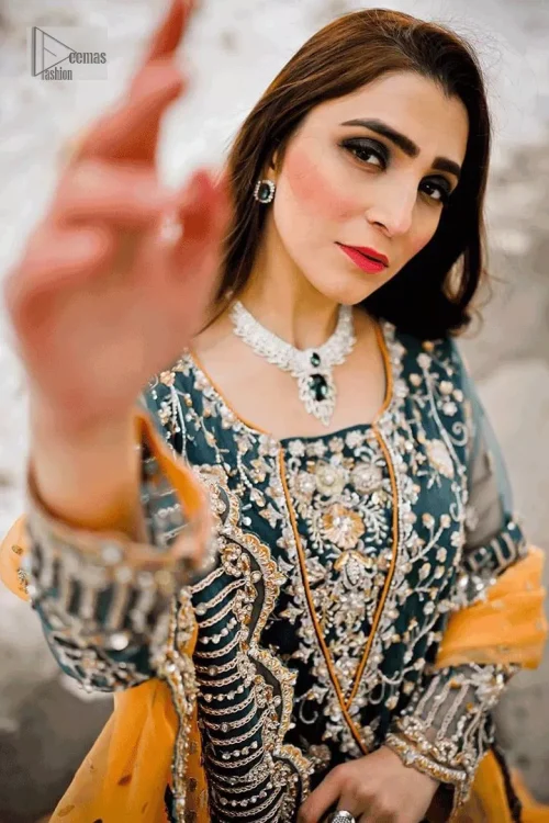 Make your Mehndi ceremony unforgettable with this thoughtfully tailored outfit, guaranteed to make you the centre of attention.