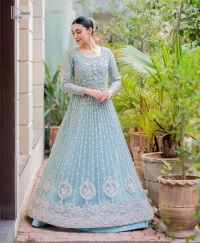 Introducing our stunning sky-blue Walima outfit, a masterpiece of artistry and elegance.