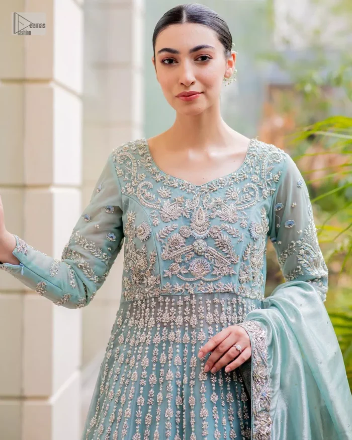 This attire showcases a harmonious fusion of traditional and modern design elements, adorned with intricate silver embellishments that include tilla, dabka, kora, Kundan and the real magic of Zardozi. The flowing maxi and lehenga both provide comfort and style, ensuring you radiate confidence on your special day.