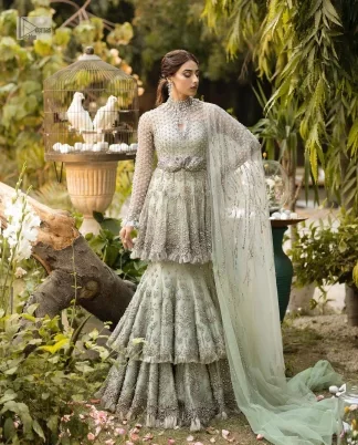 Elevate your elegance with our exquisite Soft green Nikah outfit, meticulously crafted for your special day.