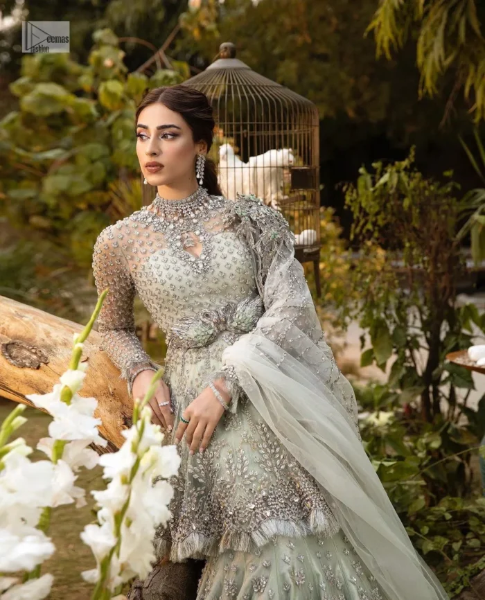Make a lasting impression with this opulent attire, we completed this look with a dupatta with sequins sprayed all over, tailored to perfection for your Nikah celebration.