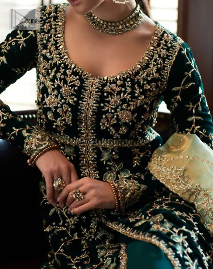 Outfits that define you. DeemasFashion presents the party wear in deep green colour which is adorned with light golden embroidery. It is enhanced with tilla, dabka, kora Kundan and the real magic of Zardozi. The round neckline makes this epitome of beauty. Furthermore, the full sleeves of the front open gown intensify the beauty of the outfit. It is coordinated with a plain lehenga with a border embellished to make you feel fresh and bold at the same time. Complete this attire with a dupatta in ivory colour which is ornamented with a four-sided embellished border to give a royal touch.
