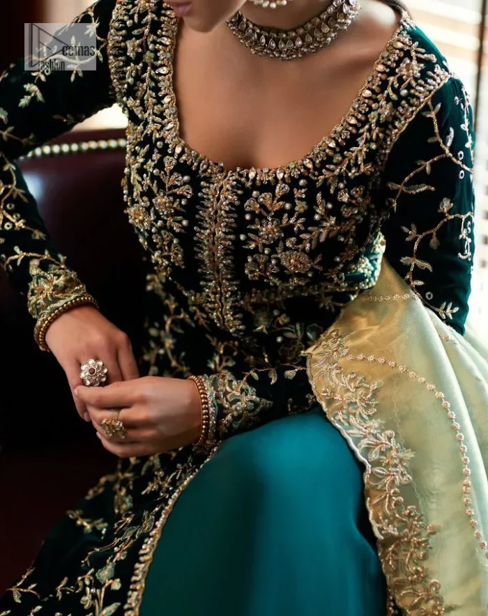 Outfits that define you. DeemasFashion presents the party wear in deep green colour which is adorned with light golden embroidery. It is enhanced with tilla, dabka, kora Kundan and the real magic of Zardozi. The round neckline makes this epitome of beauty. Furthermore, the full sleeves of the front open gown intensify the beauty of the outfit. It is coordinated with a plain lehenga with a border embellished to make you feel fresh and bold at the same time. Complete this attire with a dupatta in ivory colour which is ornamented with a four-sided embellished border to give a royal touch.