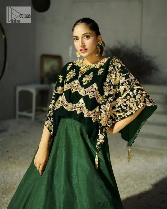 Style. Warmth. Performance & versatility!  This stuns in a beautifully handcrafted green top enshrined with light golden embellishment and detailed intricate floral & geometric patterns. The round neckline enhances the beauty of the outfit. Further, the floral designs on the sleeves make this outfit unique and attractive. It is coordinated with a plain organza lehenga in the same colour to balance your overall outfit. Collectively, this ensemble is the true essence of DeemasFashion bridals.