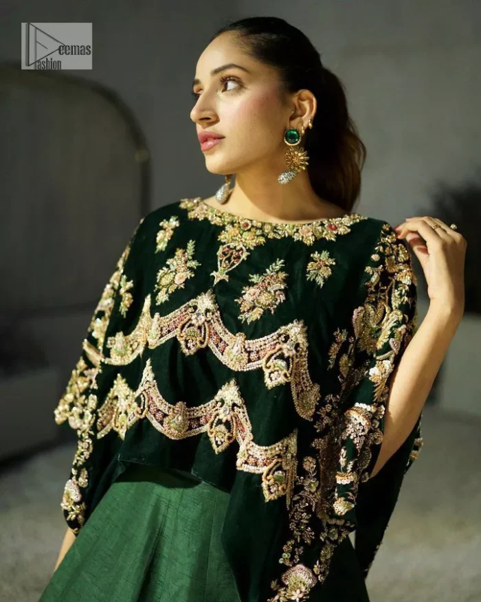 Style. Warmth. Performance & versatility!  This stuns in a beautifully handcrafted green top enshrined with light golden embellishment and detailed intricate floral & geometric patterns. The round neckline enhances the beauty of the outfit. Further, the floral designs on the sleeves make this outfit unique and attractive. It is coordinated with a plain organza lehenga in the same colour to balance your overall outfit. Collectively, this ensemble is the true essence of DeemasFashion bridals.