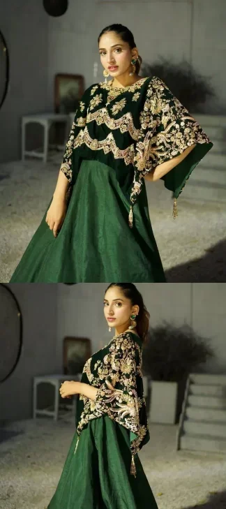 Style. Warmth. Performance & versatility!  This stuns in a beautifully handcrafted green top enshrined with light golden embellishment and detailed intricate floral & geometric patterns. The round neckline enhances the beauty of the outfit. Further, the floral designs on the sleeves make this outfit unique and attractive. It is coordinated with a plain organza lehenga in the same colour to balance your overall outfit. Collectively, this ensemble is the true essence of DeemasFashion bridals.