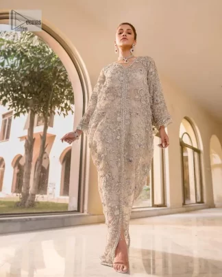 Embrace the essence of your Walima celebration with this exceptional outfit that is coordinated with capri pants and a blouse, tailored to reflect your distinct style.