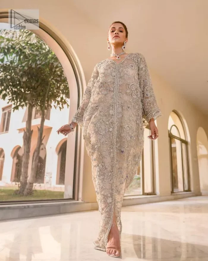 Embrace the essence of your Walima celebration with this exceptional outfit that is coordinated with capri pants and a blouse, tailored to reflect your distinct style.
