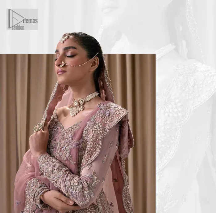 Stand out and stay pink with this nikah wear! The delightful article in pink colour is a traditional masterpiece that will give the gorgeous bride a head-turning look at the wedding. The frock has a sweetheart neckline to make this outfit lovely. It is adorned with silver and golden embroidery which is magnified with tilla, dabka, Koran, Kundan and the details of Zardozi. Further, the combination of tiny and large floral motifs on full sleeves provides a perfect finishing look to this masterpiece. It is paired up with a lehenga in the same colour making it an epitome of beauty and grace. Finish this with a dupatta framed with four-sided embellished scalloped borders and tiny floral motifs all over.
