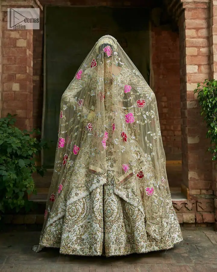 This outfit is a masterpiece of elegance, featuring intricate embellishments and premium materials.