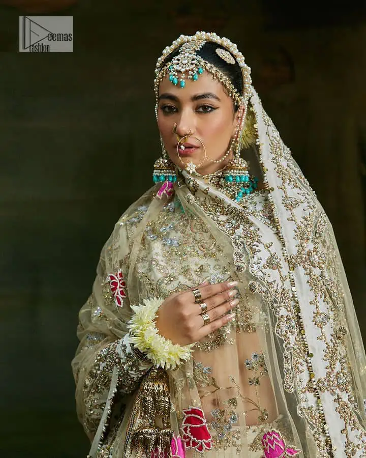 Carefully crafted design offers a comfortable and flattering fit having multiple colour embroidery which involves tilla, dabka, kora, Kundan and the real magic of Zardozi