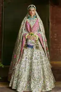 Make your Nikah a truly memorable occasion with our exquisitely tailored outfit, designed to enhance your natural beauty and captivate all in attendance. The dress comes with a single dupatta. It has a mixture of machine and hand embroidery but we will only do hand embroidery.