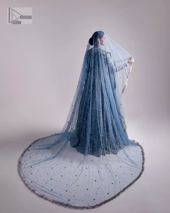 Stay blue and look your best! A sky blue lehenga choli is hand embellished with floral patterns and botanical motifs. The blouse is encrusted with silver embroidery which is enhanced with tilla, dabka, kora, Kundan and the real magic of Zardozi. The jewel neckline and full sleeves make this masterpiece lovely and charming. It is paired up with a lehenga in the same colour that has embellished on the front and back finish. Complete the walima wear with a dupatta having four-sided Kiran and tiny floral motifs all over just to complete the look.