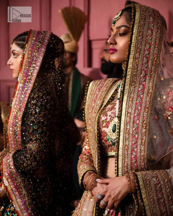Make your superb days bright and bold! A jet black blouse with floral branches, peacock motifs and Mughal-inspired embellishments with dabka, naqshi, cut dana, Resham, Swarovski, Zardozi, tilla and Kundan. It is supported with a round neckline and full sleeves to make this masterpiece a traditional look. The lehenga has an embellished border around its flare that is complemented and decorated with multiple colour embroidery. It is paired with an organza dupatta in the same colour with a sequin-sprayed surface and intricately embellished borders on all sides.