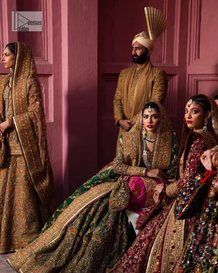 Make your superb days bright and bold! A jet black blouse with floral branches, peacock motifs and Mughal-inspired embellishments with dabka, naqshi, cut dana, Resham, Swarovski, Zardozi, tilla and Kundan. It is supported with a round neckline and full sleeves to make this masterpiece a traditional look. The lehenga has an embellished border around its flare that is complemented and decorated with multiple colour embroidery. It is paired with an organza dupatta in the same colour with a sequin-sprayed surface and intricately embellished borders on all sides.