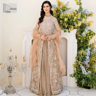 Ultra feminine look in an enthralling shade of brown for an aesthetically pleasing style statement. The beautiful light brown front open scalloped maxi with a medley of hand-embellished floral motifs of silver colour is intensified with tilla, dabka, Kora, Kundan and details of Zardozi. The neckline has an embellished V shape to add elegance and sophistication. Further, the full sleeve style of the following maxi enhances the charms. It is paired with a flared lehenga to complete the view of the nikah article. A frilled net dupatta is finished to complete a gorgeous outfit.