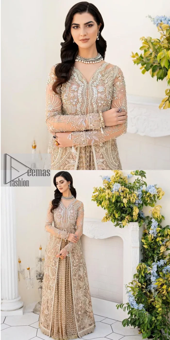 Ultra feminine look in an enthralling shade of brown for an aesthetically pleasing style statement. The beautiful light brown front open scalloped maxi with a medley of hand-embellished floral motifs of silver colour is intensified with tilla, dabka, Kora, Kundan and details of Zardozi. The neckline has an embellished V shape to add elegance and sophistication. Further, the full sleeve style of the following maxi enhances the charms. It is paired with a flared lehenga to complete the view of the nikah article. A frilled net dupatta is finished to complete a gorgeous outfit.