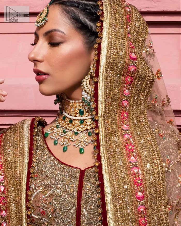 Create a look that’s for you with just one twist of this reception wear. A soft brown short shirt heavily embellished with tilla, dabka, Kora, Zardozi and Kundan. This beautiful dress has Mughal-inspired motifs, geometrical patterns, floral motifs and appliquéd silks. The round neckline makes this masterpiece unique and lovely. In addition to this, the full sleeves also admire its beauty. A lehenga supports it with an embellished border. The organza dupatta has a sequin-sprayed surface with branching floral motifs and it is enveloped with four-sided beautiful borders.