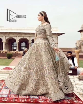 The beautiful floral patterns of this walima wear for versatile you! The?blouse is intricately emblazoned with multiple colour embellishments. Beautiful floral designs on the neckline and full sleeves give an elegant touch to the blouse. It is paired up with a flared lehenga having heavy embroidery to make your day as bright as the colour of the outfit. Graceful details of tilla, resham, sequins, and stones make this beautiful outfit a perfect choice. Complete this outfit with a dupatta framed with four-sided borders and tiny floral motifs all over to make your day versatile and charming.