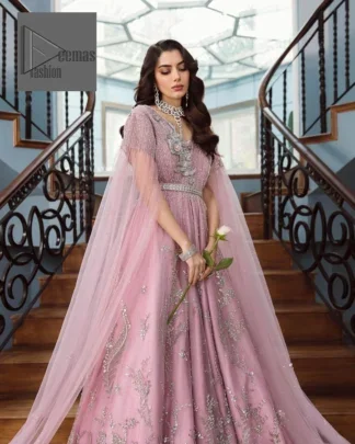 DeemasFashion presents this wedding outfit which is an embellished masterpiece that wins everyone’s hearts at the very first glance with its charm and elegance. The Maxi in the Pink colour has laden with Silver embroidery which makes this attire a head-turning masterpiece. Further, the v-neckline is fully embellished with tilla, dabka, kora, Kundan, and pearls that is giving it a magical look. The hanging sleeves style makes this outfit a little attractive but super charming. Complete this article with a dupatta, framed with a four-sided border.
