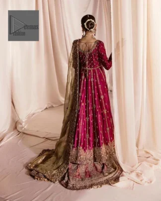 Be a dreamy vision in this reception wear. The beautiful frock in the shocking pink shade is embellished with intricate designs and fine details. It is enhanced with hand-crafted golden embroidery with details of tilla, dabka, kora, Kundan and magic of Zardozi. The round neckline and full sleeves feature a heavily crafted floral pattern enhanced by cutwork detailing. The following frock is organized with a filled lehenga whose border is beautifully decorated with embroidery making it an epitome of beauty and grace. Furthermore, The embellished borders of the golden dupatta give a perfectly glamorous look to the beautiful overall outfit.