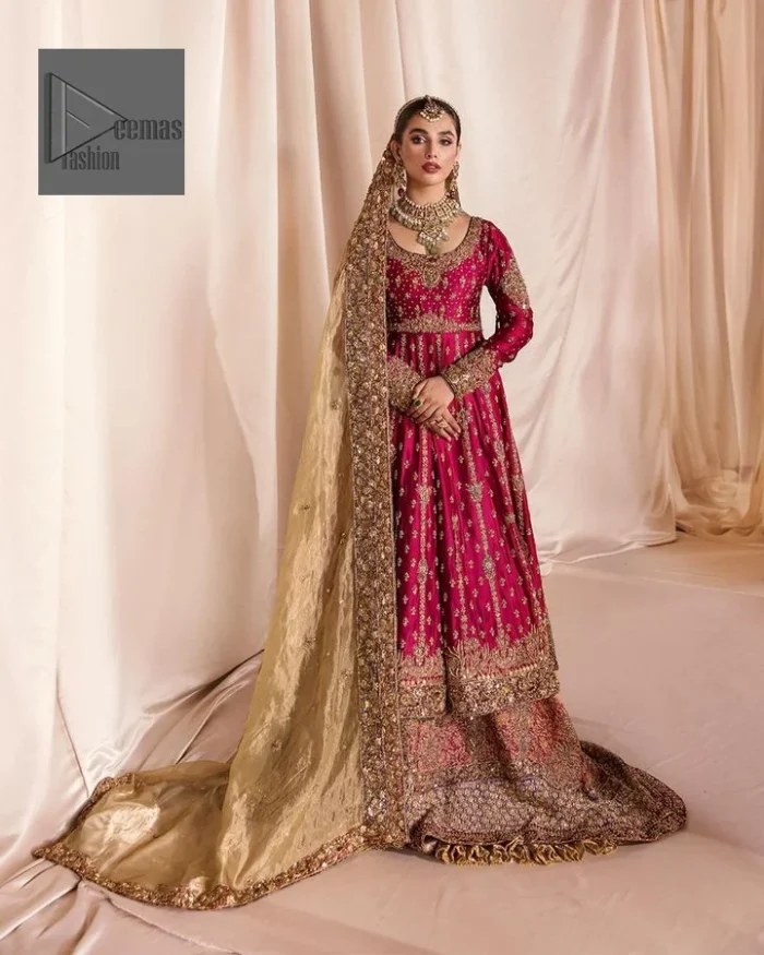 Be a dreamy vision in this reception wear. The beautiful frock in the shocking pink shade is embellished with intricate designs and fine details. It is enhanced with hand-crafted golden embroidery with details of tilla, dabka, kora, Kundan and magic of Zardozi. The round neckline and full sleeves feature a heavily crafted floral pattern enhanced by cutwork detailing. The following frock is organized with a filled lehenga whose border is beautifully decorated with embroidery making it an epitome of beauty and grace. Furthermore, The embellished borders of the golden dupatta give a perfectly glamorous look to the beautiful overall outfit.