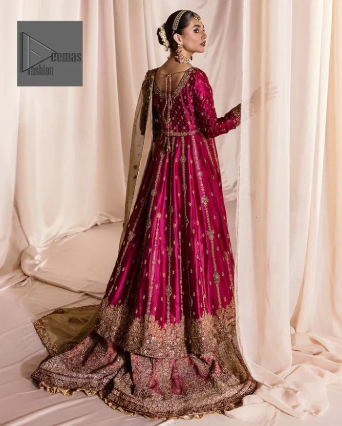 Be a dreamy vision in this reception wear. The beautiful frock in the shocking pink shade is embellished with intricate designs and fine details. It is enhanced with hand-crafted golden embroidery with details of tilla, dabka, kora, Kundan and magic of Zardozi. The round neckline and full sleeves feature a heavily crafted floral pattern enhanced by cutwork detailing. The following frock is organized with a filled lehenga whose border is beautifully decorated with embroidery making it an epitome of beauty and grace. Furthermore, The embellished borders of the golden dupatta give a perfectly glamorous look to the beautiful overall outfit.