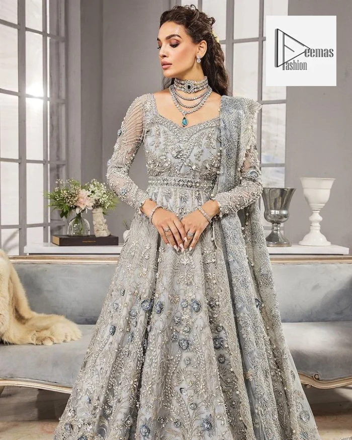 A beautiful organza dupatta with sequins spray and beautiful embellished border completes the look.