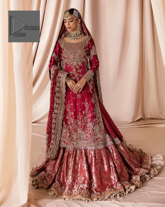 The maroon color is the perfect feminine and delicate shade with its meticulously crafted untruth The gorgeous shirt is embellished with tilla, dabka, kora, Kundan, and Zardozi. The colour of the embroidery is gold. Everyone is captivated by the shirt’s boat shape neckline. Moreover, the shirt’s three quarter sleeves are embellished with floral designs. It is coordinated with scalloped lehenga having beautiful border embellished. Complete this outfit with dupatta framed with a four sided embellished scalloped borders
