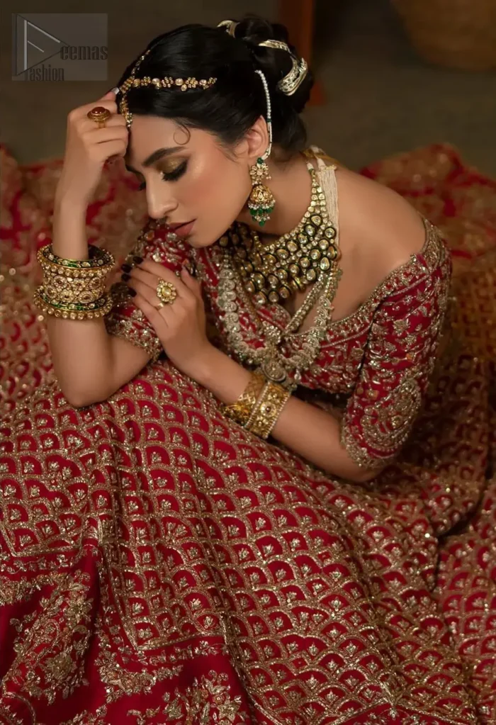 This dress is not like any other – it's a super unique blouse lehenga. Its dark antique and brass shades embroidery involves tilla, dabka, kora, Kundan and Zardozi to make you look amazing and feel great.