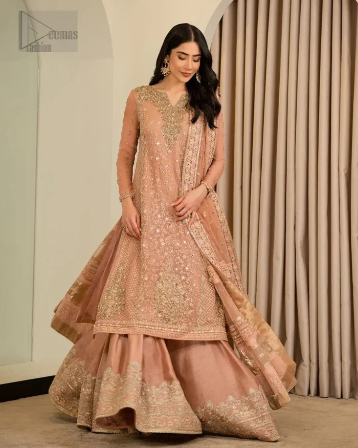 It is paired up with a dupatta having four sides embellished border. Elevate your Nikah ceremony with this enchanting dress, an embodiment of love and devotion.