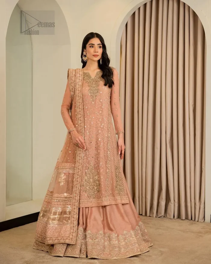 Its intricate detailing and delicate embroidery which involves tilla, dabka, kora and Kundan showcase the essence of timeless beauty, enhancing the radiance of the bride.