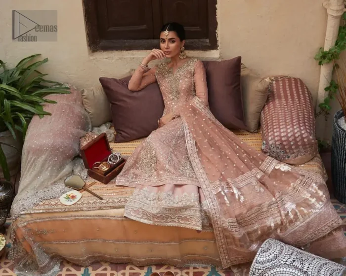 With its bordered embellished sharara made from premium materials, this Nikah dress ensures both comfort and style, allowing you to gracefully step into your new chapter.