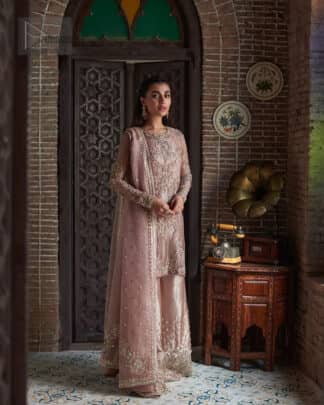 This elegant ensemble is thoughtfully designed with dark antique shades of embroidery which involves tilla, dabka, Kora, Kundan, and minimalist silhouette, allowing your natural beauty to shine on this sacred occasion.